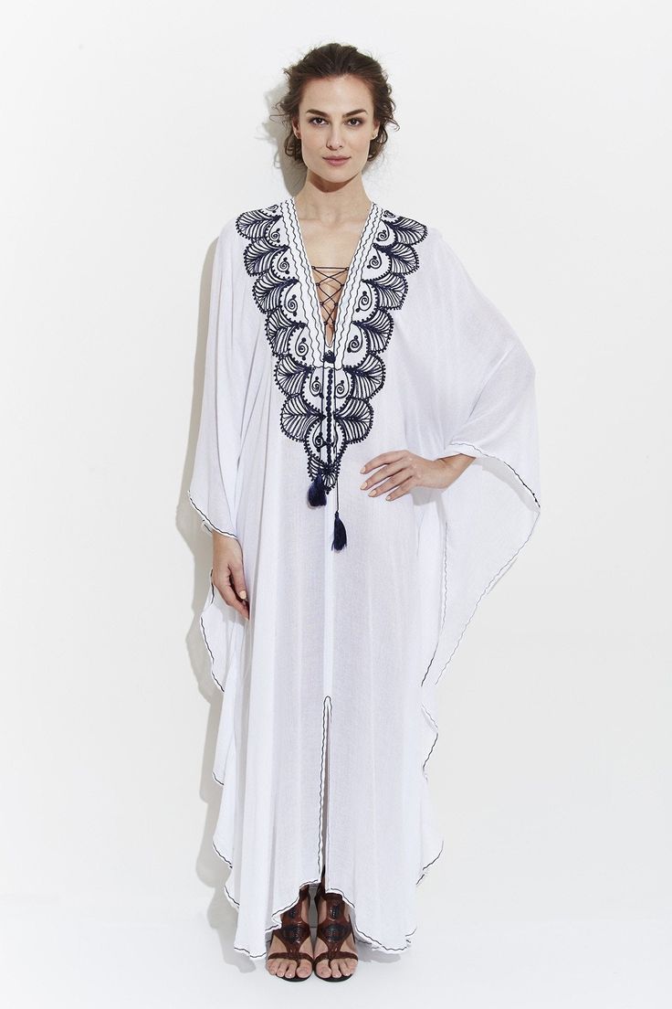 El Fenn Moroccan Kaftan Chic White Flowy Kaftan, Chic Tunic Kaftan For Vacation, Summer V-neck Thobe For Beach Cover-up, Elegant Flowy Kaftan For Vacation, White Maxi Kaftan For Loungewear, Chic White Kaftan For Beach Season, White Maxi Length Kaftan For Loungewear, White Maxi-length Kaftan For Loungewear, Chic White Kaftan For Beach Cover-up