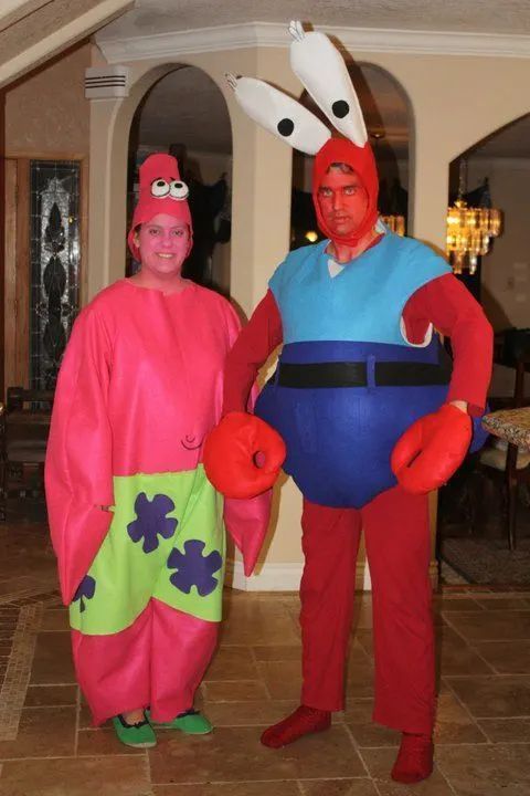 two people in costumes standing next to each other