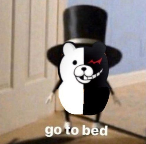 a black and white teddy bear wearing a top hat with the words go to bed on it