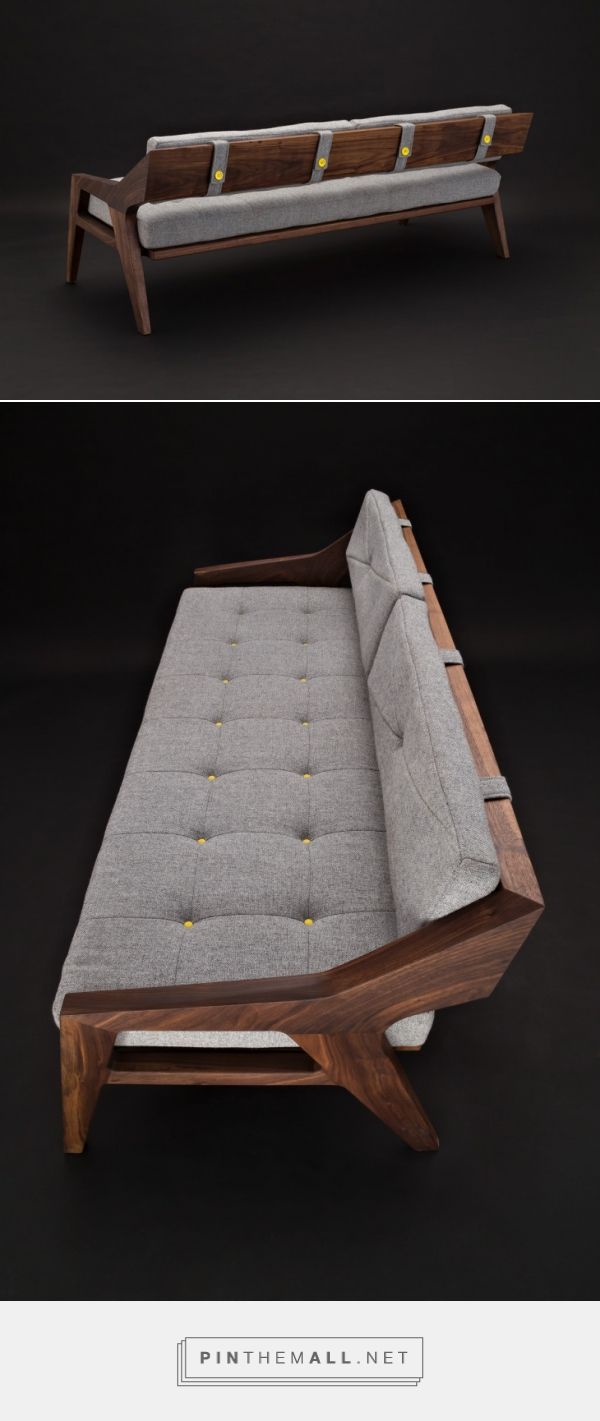 a couch that is made out of wood and fabric