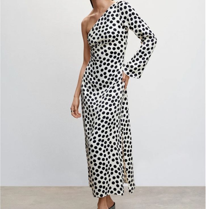 Never Worn Polka-Dot Asymmetrical Dress Still Available On Mango’s Site For $129.99! Flowy Fabric. Asymmetric Design. Straight Design. Long Design. Spots Print. Asymmetrical Neckline. Long Flared Sleeve. Side Zip Fastening. Gathered Details. Ref. 47025858-Circle-Lm Spring Midi Dress With One Sleeve And Fitted Design, Fitted One-sleeve Midi Dress For Spring, Spring One Sleeve Fitted Midi Dress, Fitted One Sleeve Midi Dress For Spring, Chic Asymmetrical Maxi Dress For Brunch, Chic Spring Maxi Dress With Asymmetrical Neckline, Chic Maxi Dress With Asymmetrical Neckline, White One-shoulder Maxi Dress For Brunch, Chic Asymmetrical Dress With Asymmetrical Neckline For Spring