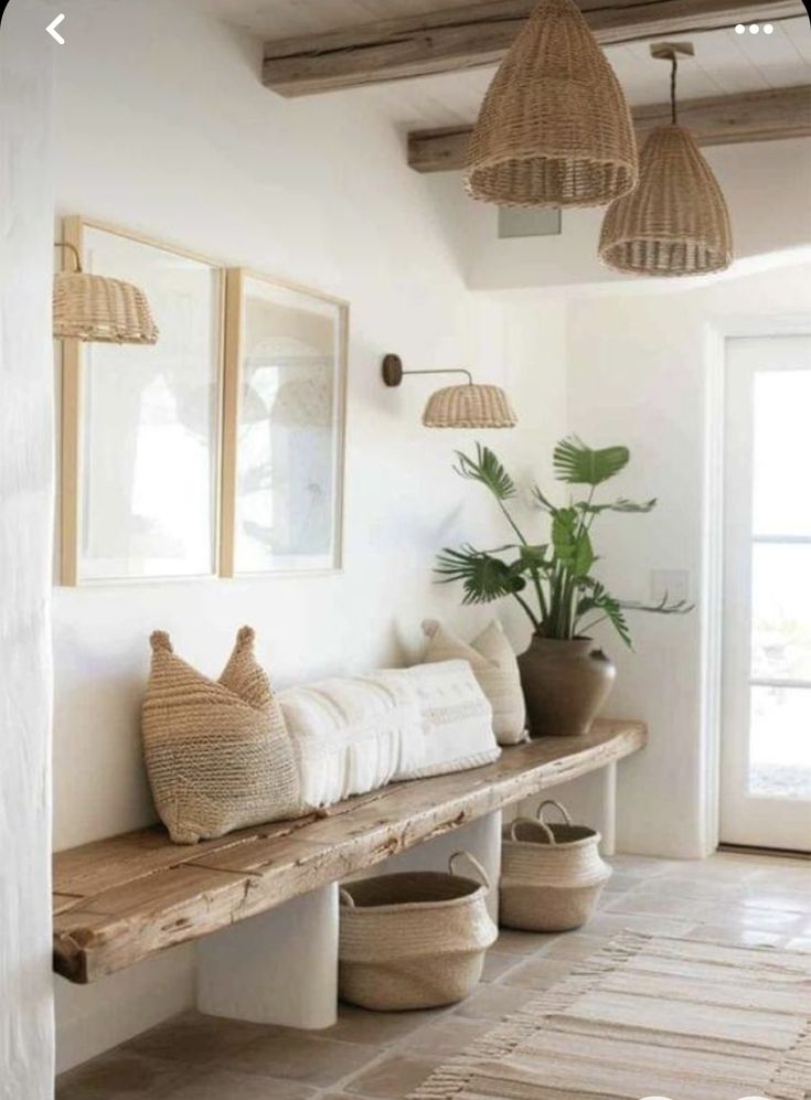 a room with some plants and baskets on the shelf