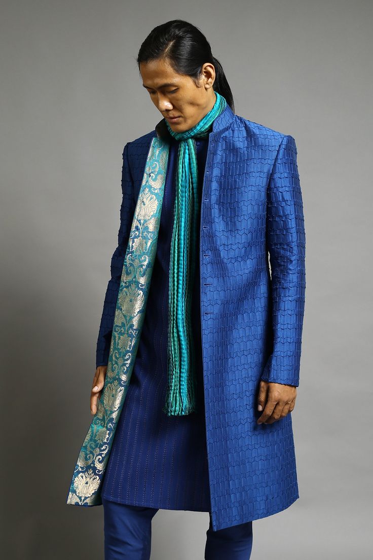 Blue bandhgala with textured pleats and front button placket.
Component: 1
Neckine: Band
Sleeve Length: Full
Color: Blue
Fabric: Chanderi
Note: Inner kurta, pant worn by the model is not for sale - Aza Fashions Blue Bandhgala, Bandhgala For Men, Not For Sale, Blue Fabric, Aza Fashion, Button Placket, Duster Coat, Color Blue, Saree