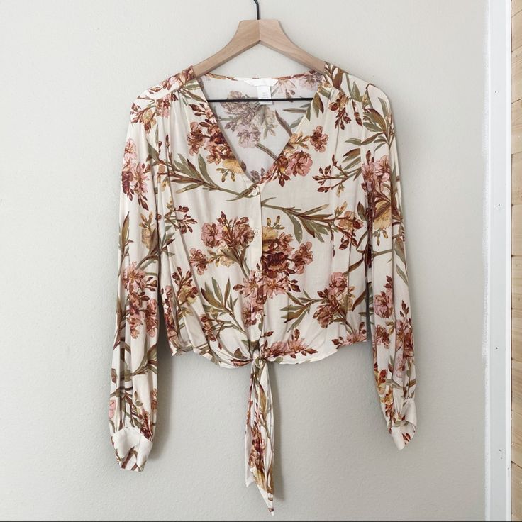 H&M Floral Button Down Tie Knot Blouse Nwot. Never Worn. Pics Show Any Sign Of Wear. Balloon Sleeves I Ship Monday-Thursday. H&m Long Sleeve Floral Print Tops, H&m Floral Print Tops For Fall, Beige Button-up Blouse With Floral Print, Beige Floral Print Button-up Blouse, Chic Floral Print Blouse By H&m, Chic H&m Blouse With Floral Print, H&m Button-up Blouse For Day Out, Spring H&m Blouse With Button Closure, H&m Spring Blouse With Button Closure