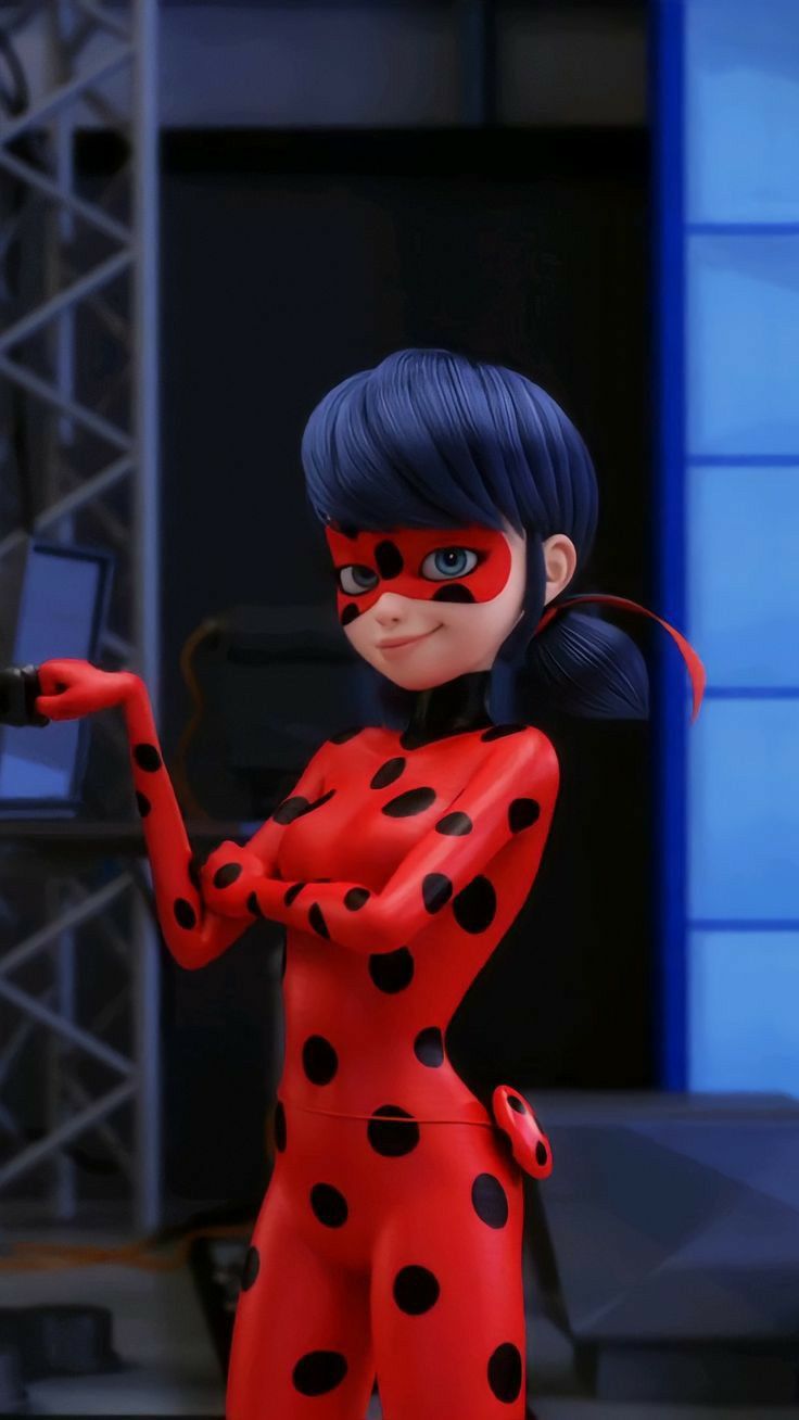 the animated character lady bug is dressed in red and black polka dots