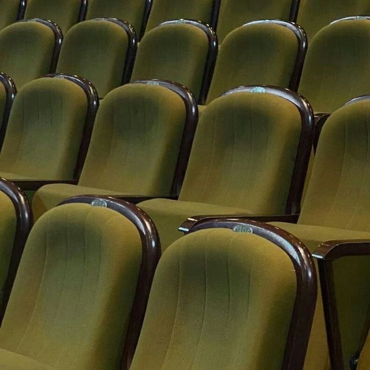 rows of empty seats in an auditorium