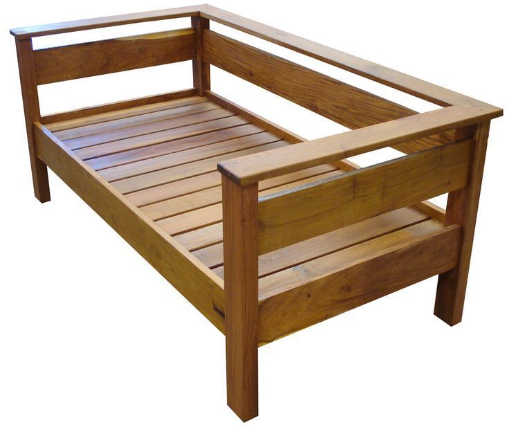 a wooden bed frame with slatted sides