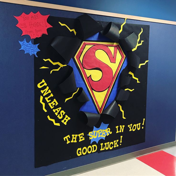 a superman themed bulletin board with the letter s on it