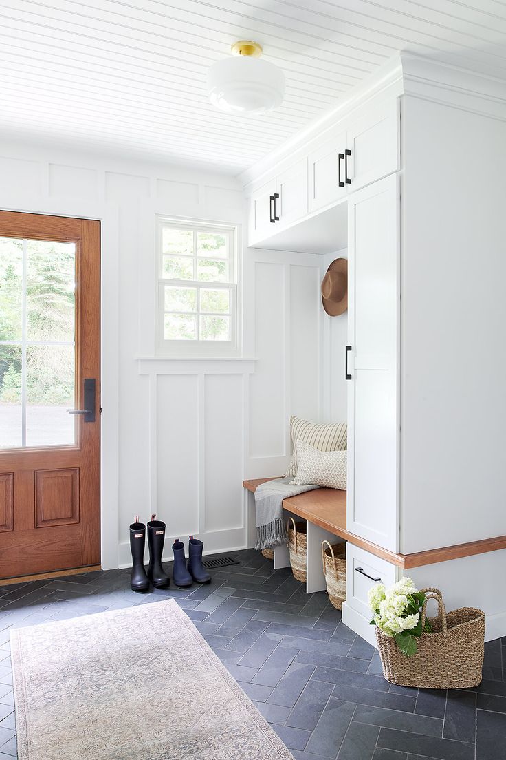 the entryway is clean and ready for guests to come home with their shoes on