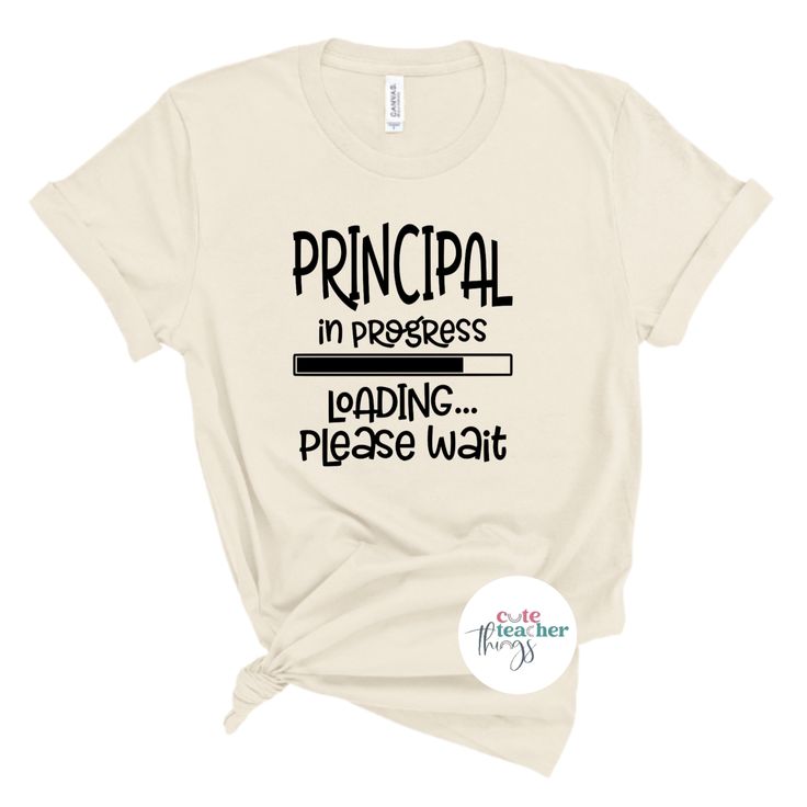 a white t - shirt with the words principals in progress loading please wait on it