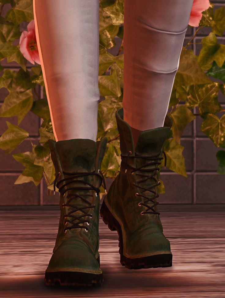 the legs and feet of a woman wearing green boots