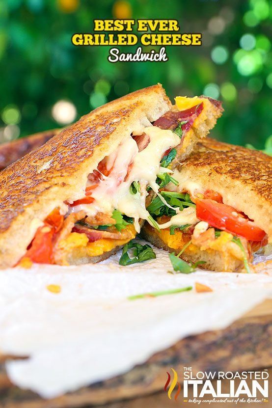 a grilled cheese sandwich with tomatoes and other vegetables