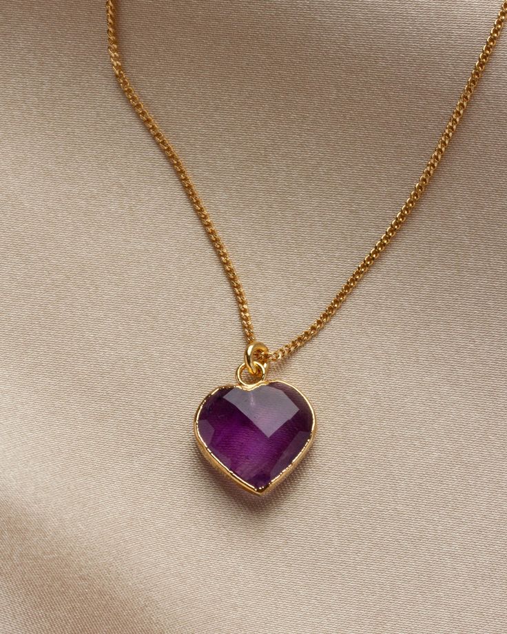 These hand-faceted heart gemstones remind us of a sweet treat. Wear this necklace and it just might spark up a conversation! Anniversary Amethyst Heart Necklace, Elegant Heart-shaped Amethyst Necklace, Heart Cut Amethyst Jewelry For Gifts, Valentine's Day Amethyst Gemstone Jewelry, Heart-shaped Amethyst For Jewelry Making, Heart Shaped Amethyst For Jewelry Making, Amethyst Gemstone Jewelry For Valentine's Day, Valentine's Day Amethyst Heart Necklace, Elegant Amethyst Necklaces For Valentine's Day