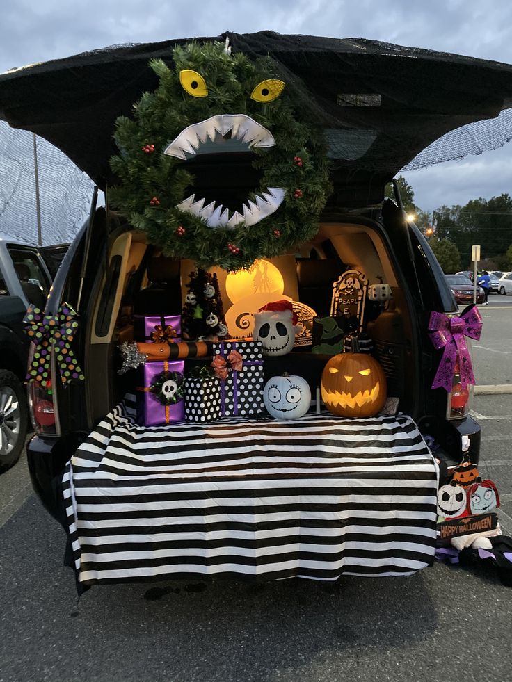 the trunk of a car decorated for halloween