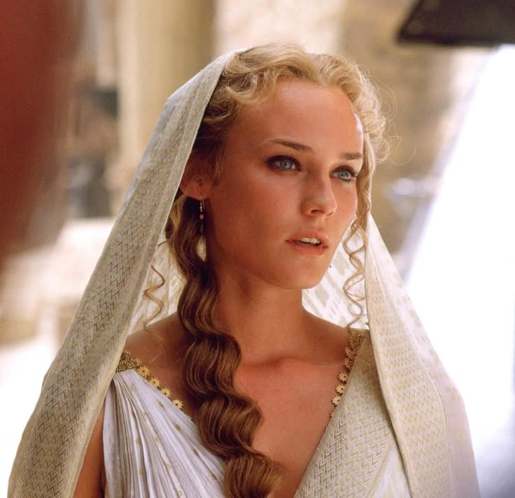 a woman wearing a white dress and veil in a scene from the movie princess bride