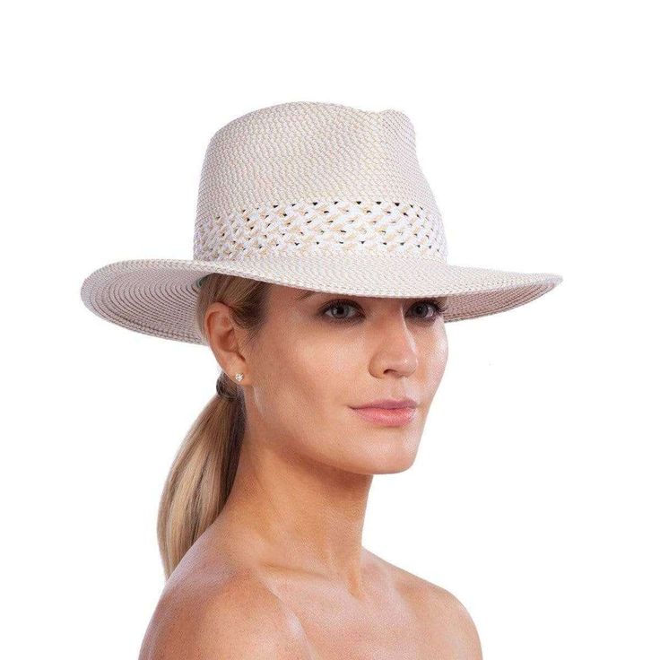 When you shop for women's designer fedora hats for sale online, be sure to take a close look at our Squishee® Bayou, a traditional fedora, hand-blocked of our patented Squishee® material. Squishee® Bayou is untrimmed, reflecting a very laid back casual sense of style. An integrated open weave band at the crown's base permits increase air-flow on the hottest of summer days. Squishee® is a man-made material incorporating recycled fibers. It looks and feels just like natural raffia but has the adva Veiled Hats, Bowler Hat, Women's Headwear, Pink Sunglasses, Straw Tote, Hats For Sale, Brim Hat, Fedora Hat, Ultra Violet