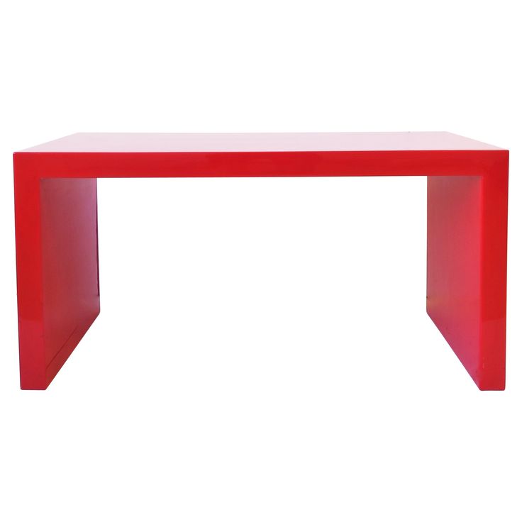 a red table sitting on top of a white floor