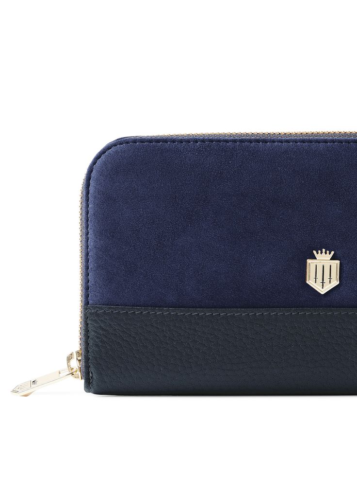 Say hello to purse perfection. Stylish in its simplicity, our signature Salisbury is your one-way ticket to accessory heaven. Available in an array of colours so you can match it to your handbag, it’ll hold your cash and cards in the prettiest way possible. Too big for your favourite bag? Try our Mini Salisbury… Leather exterior: made from the finest materials Full zip closure: keeps your coins and cards safely inside Inner zipped compartment: to keep things tidy Branded zip pull and gold shield Luxury Everyday Rectangular Wallet, Gold Shield, Fairfax And Favor, Salisbury, Womens Purses, Blue Suede, The Navy, Say Hello, Coin Purse