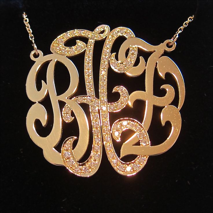 "A very special version of our medium (1.25\") monogram necklace! In this absolutely stunning necklace, the center initial is covered with beautiful F-G color, VS1-VS2 clarity diamonds. The total carat weight and count of the diamonds will vary slightly depending on which letter the center initial is. The H in the necklace pictured is covered in 82 diamonds with a weight of 0.50 ct. Also, the 14k gold plate is significantly thicker and heavier than the plate used for our traditional monograms. T Gold Monogram Necklace, Monogram Pendant Necklace, 14k Gold Initial Necklace, Monogram Necklace Gold, Diamond Monogram, Personalized Gold Necklace, Gold Initial Pendant, Solid Gold Charms, Push Present