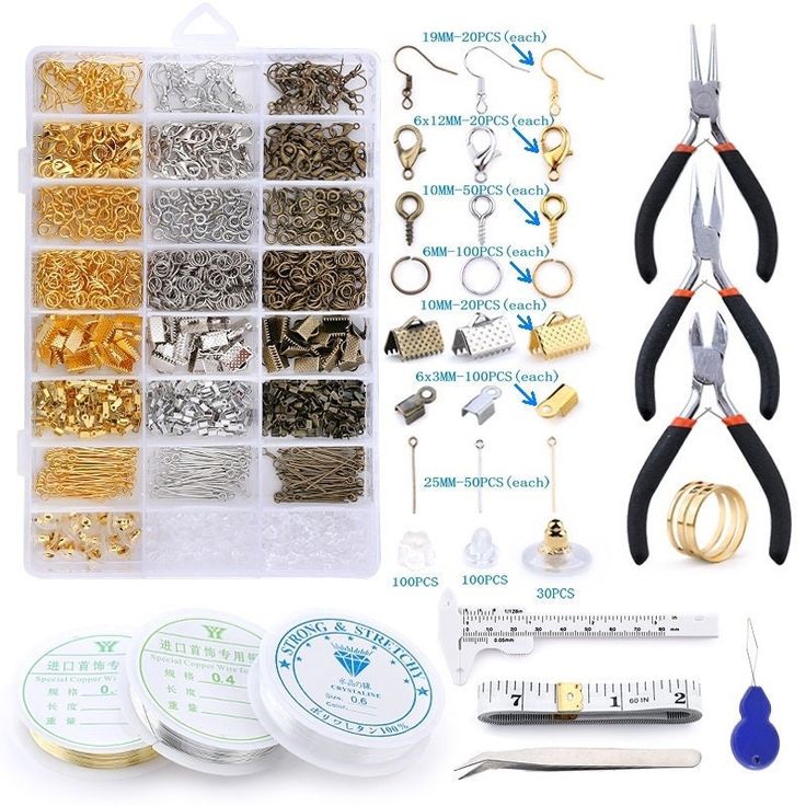 the contents of a craft kit including scissors, beads, and other items are shown