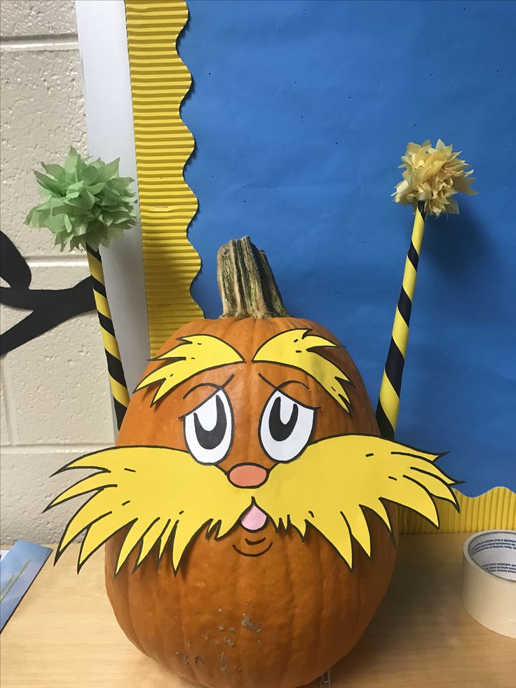 a pumpkin decorated with the face of dr seusster from the lorax