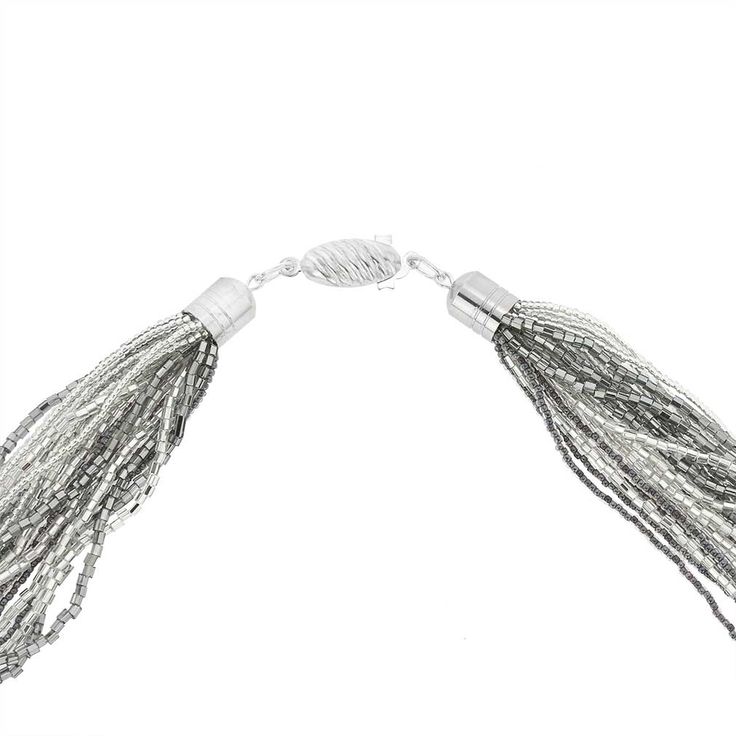 Fine and delicate, this Venetian necklace created with thousands of beautiful handcrafted silver-lined seed beads is unlike any other jewelry piece you've seen. It shimmers and sparkles due to the combination of round and tube-shaped beads for a glamorous look to match the splendor of Venice. This necklace can be twisted for more dramatic effect. The ancient tradition of crafting seed beads to make jewelry and decorate clothing flourished on Murano for centuries, and even today the best "haute c Haute Couture Designers, Glamorous Look, Seed Bead Necklace, Strand Bracelet, Glass Crafts, Murano Glass, Bead Necklace, Seed Bead, Silver Necklaces