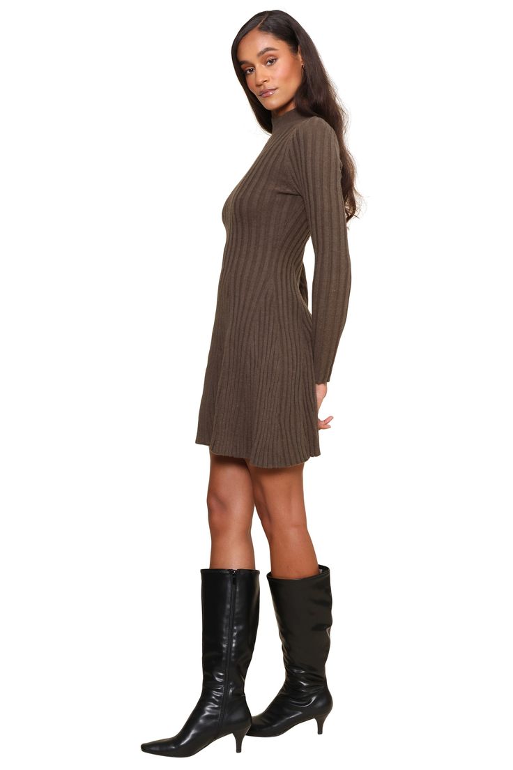 The Adi Dress is our effortless, throw-on-and-go sweater dress. It has a mock neck and slim fitting sleeves. But the magic is in the skirt, the rib is knit into godets to create a cute flounce at the sweep. Perfect with knee high boots. Spring Ribbed A-line Sweater Dress, Winter A-line Ribbed Sweater Dress, Winter Ribbed A-line Sweater Dress, Spring A-line Ribbed Sweater Dress, Stretch Knit Mini Dress For Fall, Spring High Neck Stretch Sweater Dress, Chic Stretch Sweater Dress With Turtleneck, Chic Sweater Dress With Ribbed Neckline For Fall, Fitted Turtleneck Sweater Dress For Spring