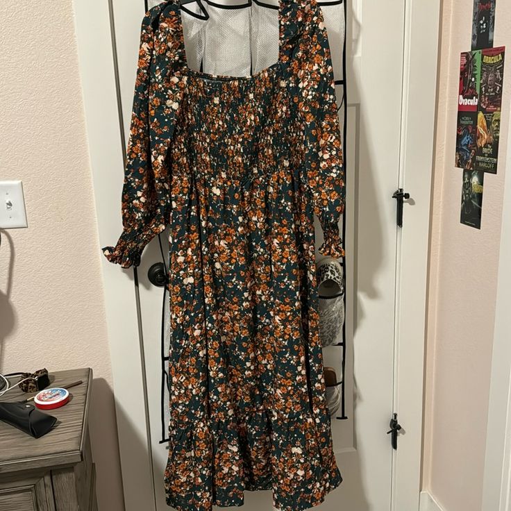 Flowy Dress, Never Worn With Tags Condition: New Fall Floral Print Orange Maxi Dress, Orange Floral Print Long Sleeve Maxi Dress, Orange Dress For Day Out In Fall, Casual Orange Long Sleeve Maxi Dress, Orange Fall Maxi Dress For Vacation, Orange Maxi Dress For Fall Vacation, Orange Maxi Dress For Fall Brunch, Fall Orange Maxi Dress For Brunch, Casual Orange Long Sleeve Midi Dress