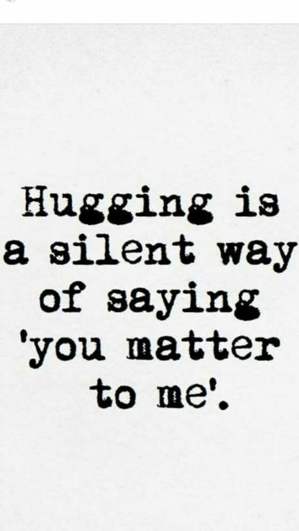 a black and white photo with the words hugging is a silent way of saying you matter to me