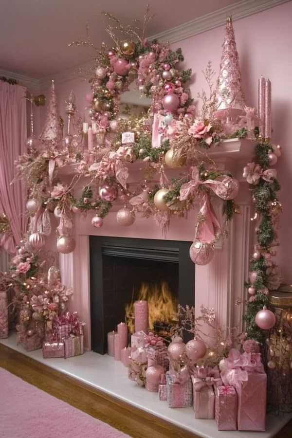 a fireplace decorated with pink and gold ornaments