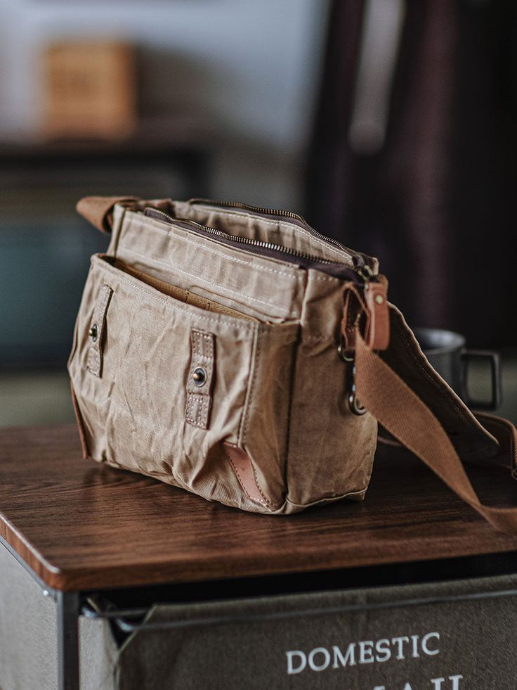 Vintage Oil Wax Waterproof Canvas Postman Bag Amekaki Worn Workwear Single Shoulder Bag Commuter Crossbody Bag 100%cotton Size:11*18*26 cm Postman Bag, Denim Overalls Shorts, Parka Coat, Denim Overalls, Instagram Shop, Bottoms Pants, Long Tops, Work Wear, Bag Accessories