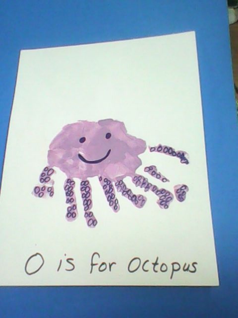 a child's handprint is shown with the words o is for octopus