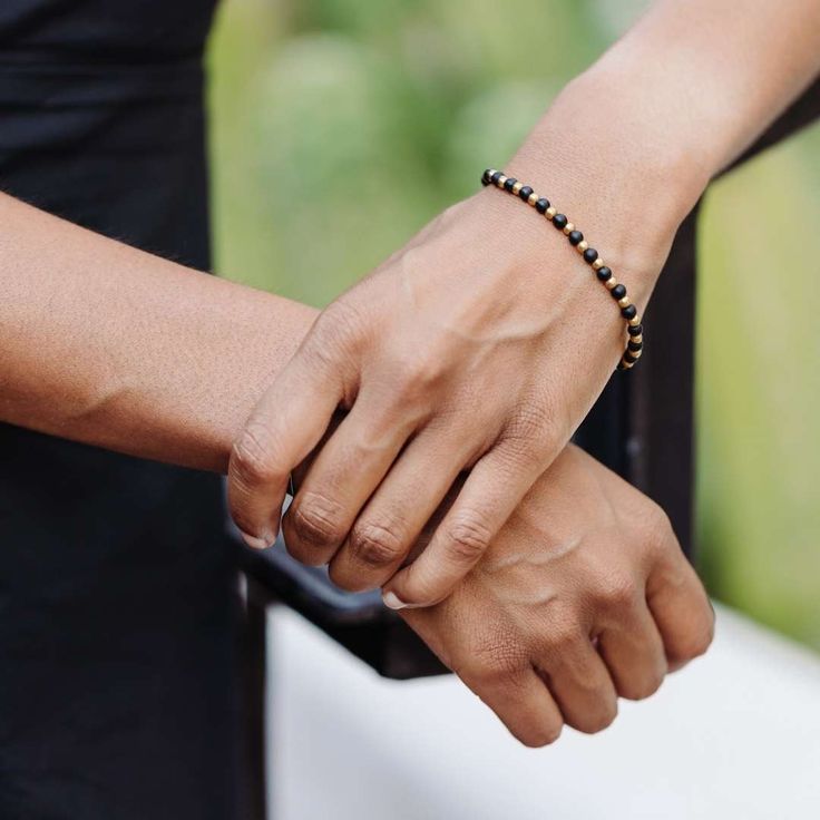 Simple and stunning black and gold beads encompass this bracelet, great for most looks and day or night. This minimalist bracelet looks great when stacked or worn solo. Pair it with our halo bracelets or Vivid necklace for a complete look. Made with love in our India Sanctuary, this ethically handmade bracelet supports young women escaping human trafficking in India, Uganda, and the Philippines. Each artisan receives fair wages, education, health care and community through our non-profit, Intern Halo Bracelet, Holistic Care, Brass Beads, Minimalist Bracelet, Black And Brass, Handmade Bracelet, Minimalist Style, Gold Beads, Non Profit