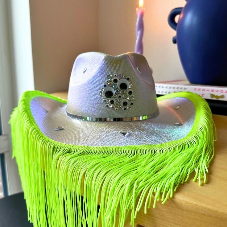 "Jeepers Peepers Googly Eyes Disco Space Cowgirl Hat 🌟 Shine like a Star in a Cosmic Rodeo  Each hat is one-size-fits-most (23\" circumference). Foam sizer inserts available *upon request* for smaller heads. Please review my shop policies. This hand-decorated iridescent cowboy hat is perfect for parties, concerts, festivals, raves, birthdays, bachelorette parties, Burning Man, Mardi Gras, costumes, photoshoots, beachwear, and MORE 💫 This statement piece also makes a stunning gift Let your space cowgirl dreams come true with this psychedelic accessory sure to turn heads 👁️ Hand-decorated in San Francisco to help you realize your cosmic cowgirl dreams  The multi-hued holographic surface casts light in all directions like a disco ball, captivating the eye from all angles 🌈  This holograph Adjustable Festival Hats With Rhinestone Fringe, Adjustable Rhinestone Fringe Hat For Festivals, Space Cowboy Party Outfit, Disco Space Cowgirl, Space Cowboy Costume, Rave Cowgirl, Cosmic Cowgirl, Cowgirl Accessories, Cowboy Costume