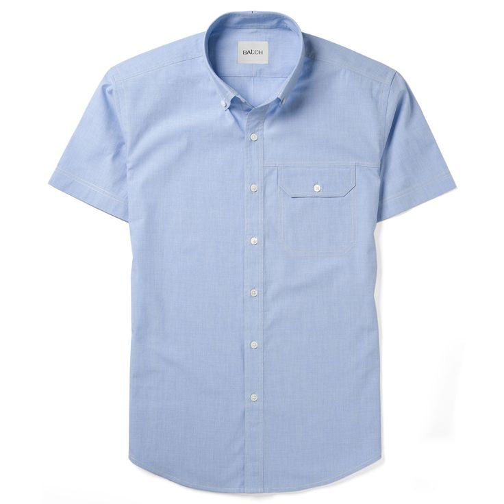 Description Details Care Fit The Builder Short Sleeve Shirt is an easy option for your warm weather needs. The single flap chest pocket adds a functional detail while keeping your look casual. The clean blue end-on-end is light weight with the breathability of a dress shirt. see more outfitting ideas here > • No-fuss button down collar• Single chest pocket for your EDC• Mother-of-pearl buttons• Premium lightweight 100% cotton end-on-end weave• Pre-washed/pre-shrunk fabric for soft hand• Always f Banded Collar Shirts, Shirt Stays, Casual Long Sleeve Shirts, Mens Short Sleeve Shirt, Pearl Buttons, Look Casual, Button Down Collar, Shirt Sale, Casual Shirt