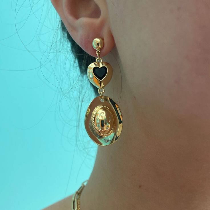 Throwing back to our vintage collections, we have run out of our deadstock materials to make these cult faves, and overhauled them to make a custom, high-quality, gold-plated alternative (as opposed to before, using brass charms that tarnish easily). These earrings are made with surgical steel posts, gold plated hat charms, and gold plated heart channel connectors. Vintage Gold Metal Plug Earrings, Vintage Gold-tone Nickel-free Jewelry, Vintage Gold-tone Earrings As Gift, Retro Brass Jewelry With Matching Earrings, Retro Brass Drop Earrings, Vintage Gold Plated Nickel Free Earrings, Collectible Metal Drop Earrings, Vintage Gold-tone Gold Plated Earrings, Nickel-free Vintage Gold-plated Earrings