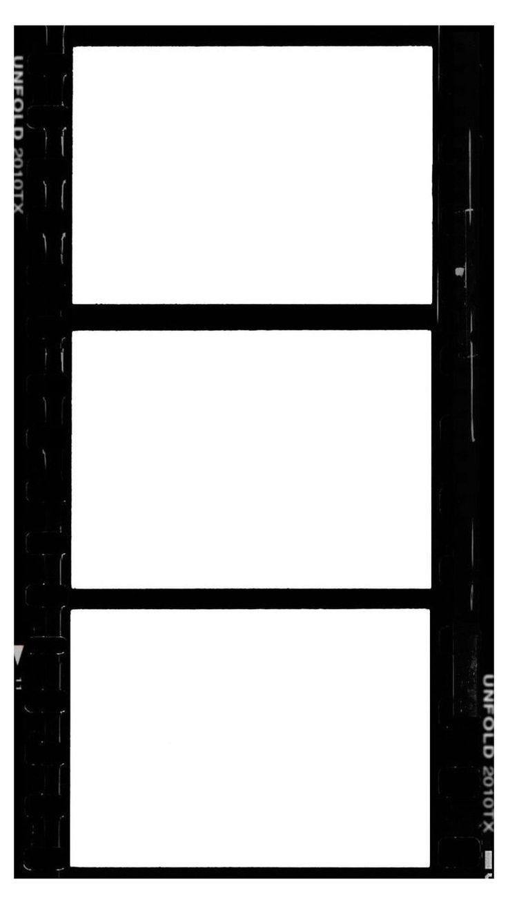 a black and white photo of a window with two windows on each side, one is empty