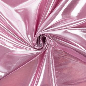 a close up view of a shiny pink fabric