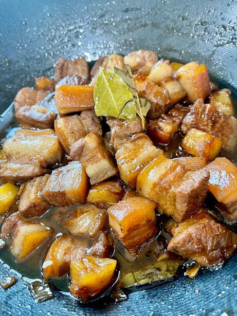 the food is cooked and ready to be eaten in the wok on the stove