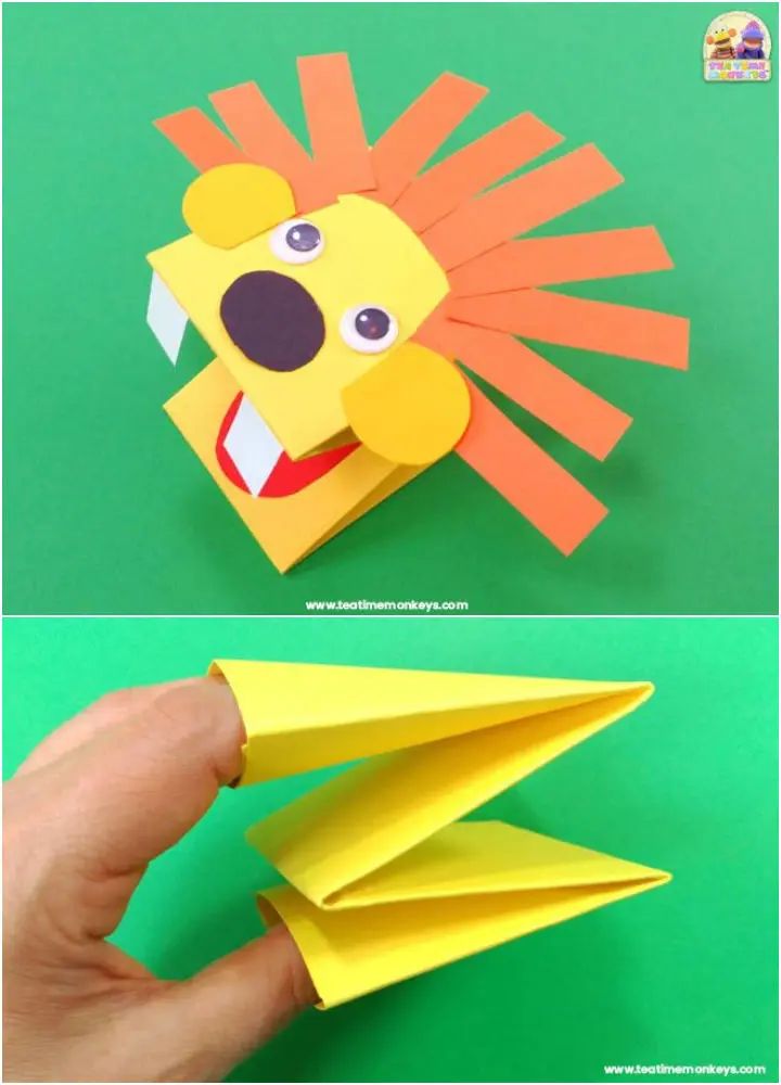 the paper lion is cut out to look like it's coming out of an origami