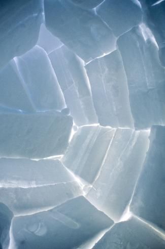 ice cubes are shown in this close up view from the bottom, with light shining on them