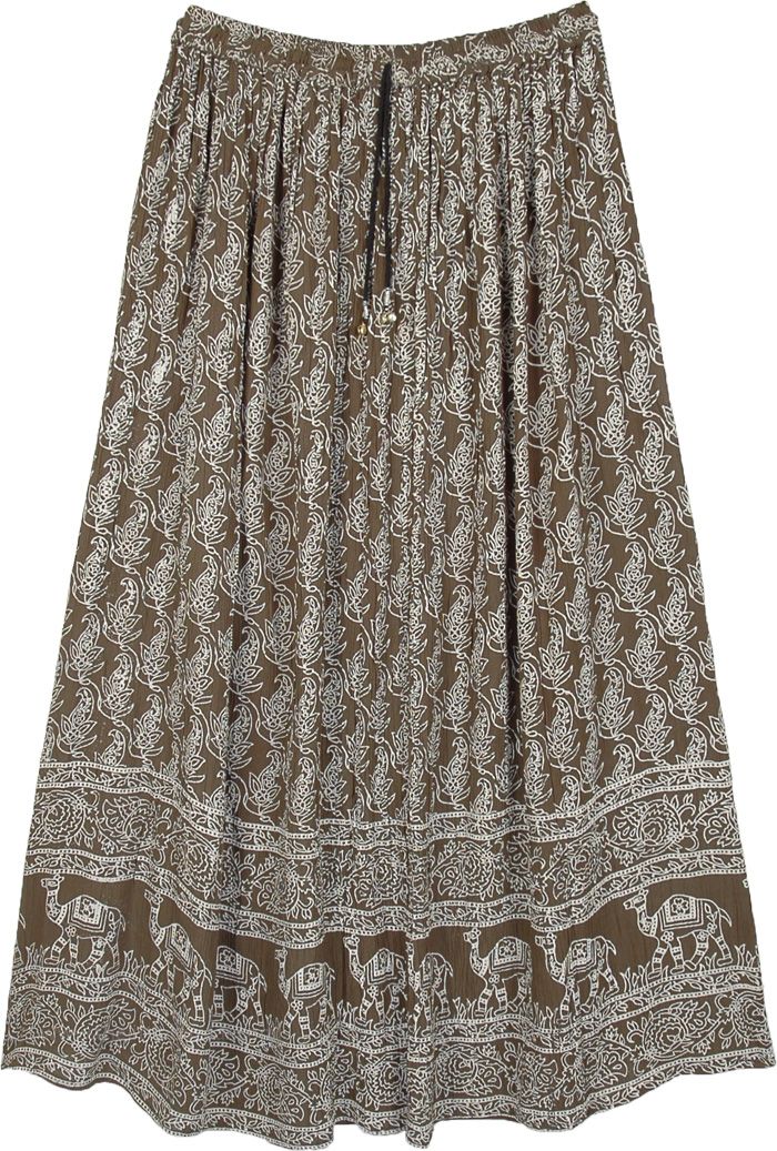 A beautiful olive green canvas for a traditional folk camel and florals print, this long skirt is chic bohemian streetwear with a crushed effect on fabric.  This free flowing breezy skirt features an elastic waistband with drawstrings to adjust the size. #tlb #MaxiSkirt #Floral #Printed #bohemianfashion #printedskirt #summerlongskirt #bohoskirt #camelprintskirt Bohemian Beige Skirt With Elastic Waistband, Green Bohemian Maxi Skirt With Elastic Waistband, Bohemian Beige Maxi Skirt With Elastic Waistband, Brown Bohemian Maxi Skirt For Vacation, Bohemian Brown Maxi Skirt For Vacation, Beige Bohemian Skirt With Elastic Waistband, Long Earthy Skirts, Beige Bohemian Flowy Maxi Skirt, Green Bohemian Long Wrap Skirt