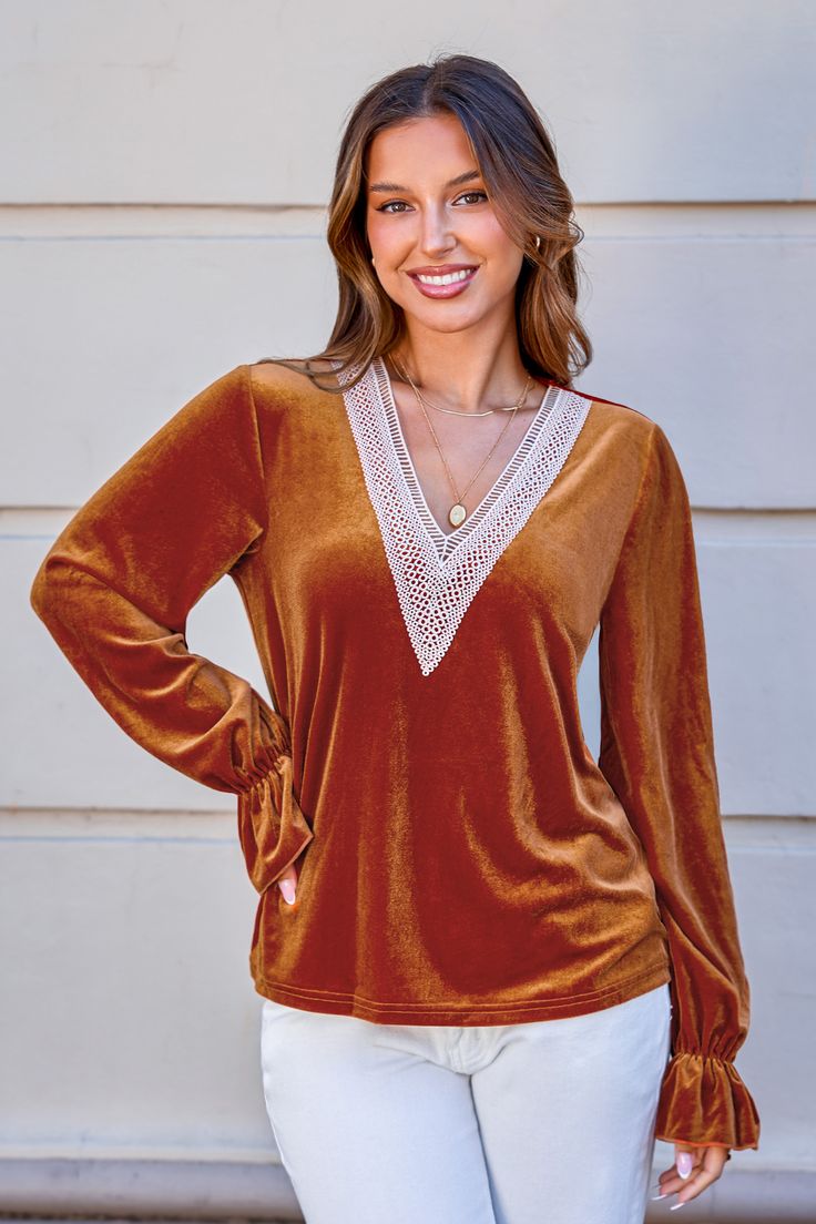 Turn up the volume on your wardrobe. The Burnt Orange V-Neck Poet Sleeve Blouse combines rich color with dramatic sleeves for a look that’s both bold and stylish. Ideal for when you want to catch some eyes. Product code: CAA04B4H046JJ Features:  Woven V-neckline Long poet sleeves Wash Method: Regular Wash Material: 95%POLYESTER,5%SPANDEX. Fall Long Sleeve Top With Bishop Sleeves, Fall V-neck Blouse With Blouson Sleeves, Winter V-neck Blouse, Long Sleeve V-neck Top For Fall Party, Fall Party Long Sleeve V-neck Top, Elegant Long Sleeve V-neck Top For Winter, Chic Bell Sleeve Long Sleeve Top For Fall, Chic Bell Sleeve Tops For Fall, Chic Long Sleeve V-neck Top For Fall