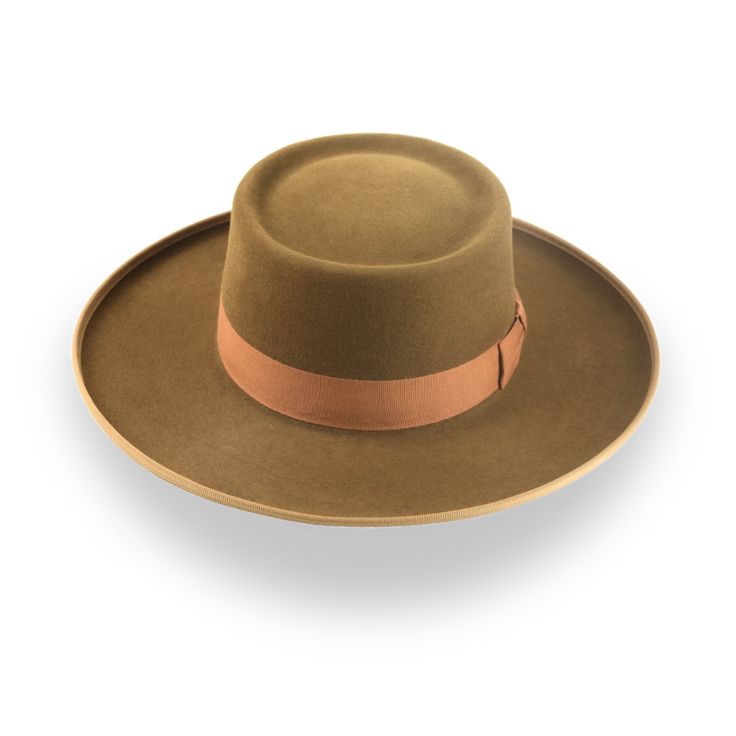 Description Materials Craftsmanship Hat Care Shipping Returns Product Description Brown Western Hat with Classic Gambler Style Experience the rugged charm of the SantaFe, a brown western hat designed with a classic western silhouette and gambler hat style. Crafted from premium rabbit fur felt, this hat features a smooth finish and a sturdy structure for long-lasting wear. The telescope crown and ribbon-bound rolled brim add to its distinctive look, making it a stylish and practical accessory. Cu Western Silhouette, Outdoor Hut, Hats For Big Heads, Gambler Hat, The Raid, Homburg, Chapeau Cowboy, Western Hat, Hat Style