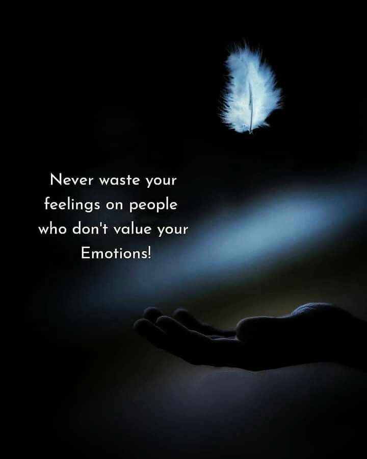 a person's hand holding a white feather with the words never waste your feelings on people who don't value your emotions