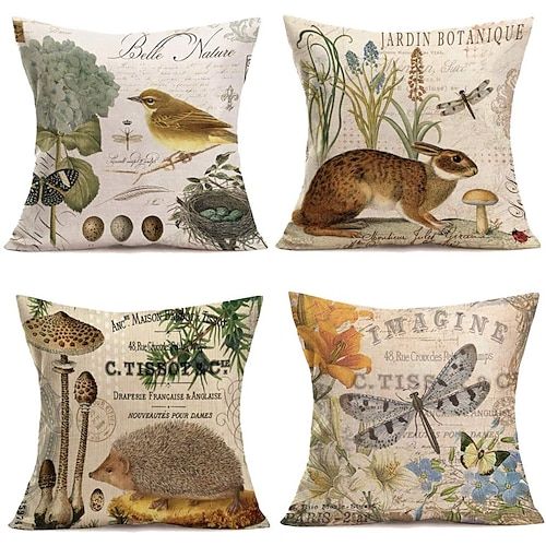 four pillows with different types of animals and plants on them, all in various colors