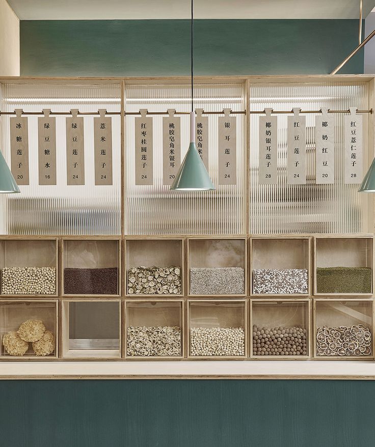 the shelves are filled with many different types of grains and other things to see on display