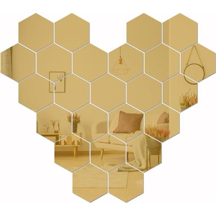 a heart shaped mirror is shown with many different things in it's reflection, including a couch and chair