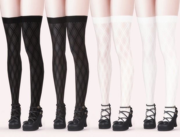 four pairs of black and white stockings with laces on them, all lined up