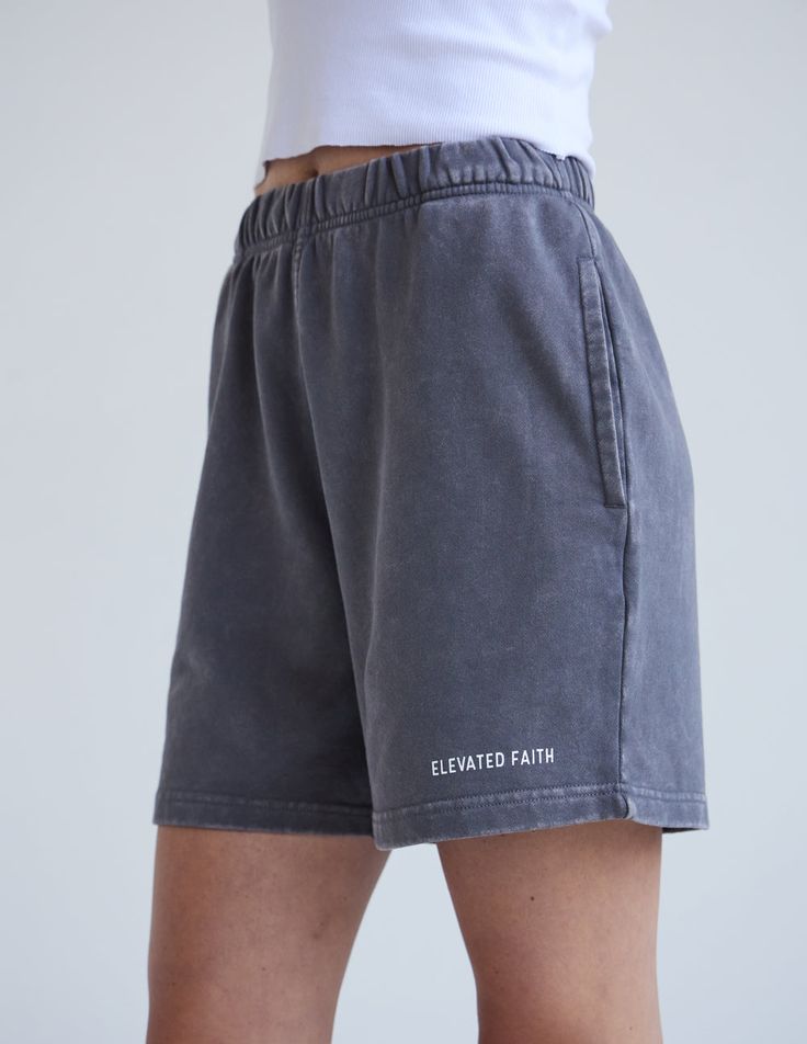 Meet your new go-to for effortless style and comfort: the Basics Women’s Short. Carefully designed to be as versatile as you are, this short is ideal for lounging or movement and sure to provide the wearability you'll need with a clean design you'll love.     Size: Model is 5'9" and wearing a size Small. Fit: Relaxed, Women's Fit Color: Smoke Grey Composition: 100% Cotton Features: Super Soft, Pre-Shrunk, Hidden Drawcord, Garment Dyed Relaxed Fit Athletic Shorts With Elastic Waistband For Loungewear, Relaxed Fit Solid Color Shorts For Leisure, Solid Color Relaxed Fit Shorts For Leisure, Comfort Waistband Shorts, Comfortable Athletic Shorts With Comfort Waistband For Loungewear, Casual Relaxed Fit Solid Athletic Shorts, Basic Relaxed Fit Everyday Shorts, Basic Relaxed Fit Summer Shorts, Basic Relaxed Fit Shorts For Everyday